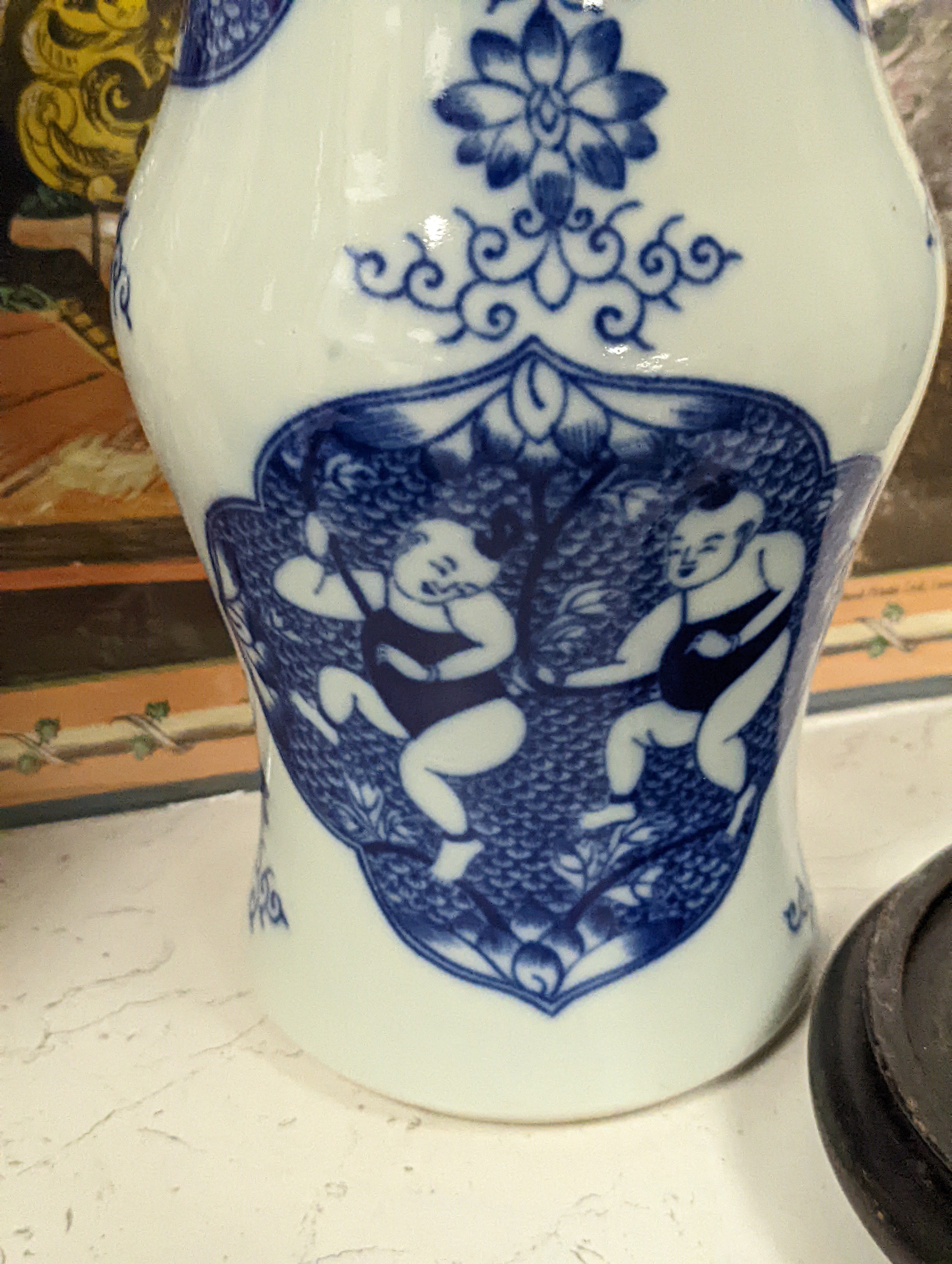 A pair of Chinese blue and white vases on stands and 6 further wood stands. Vases 35cm